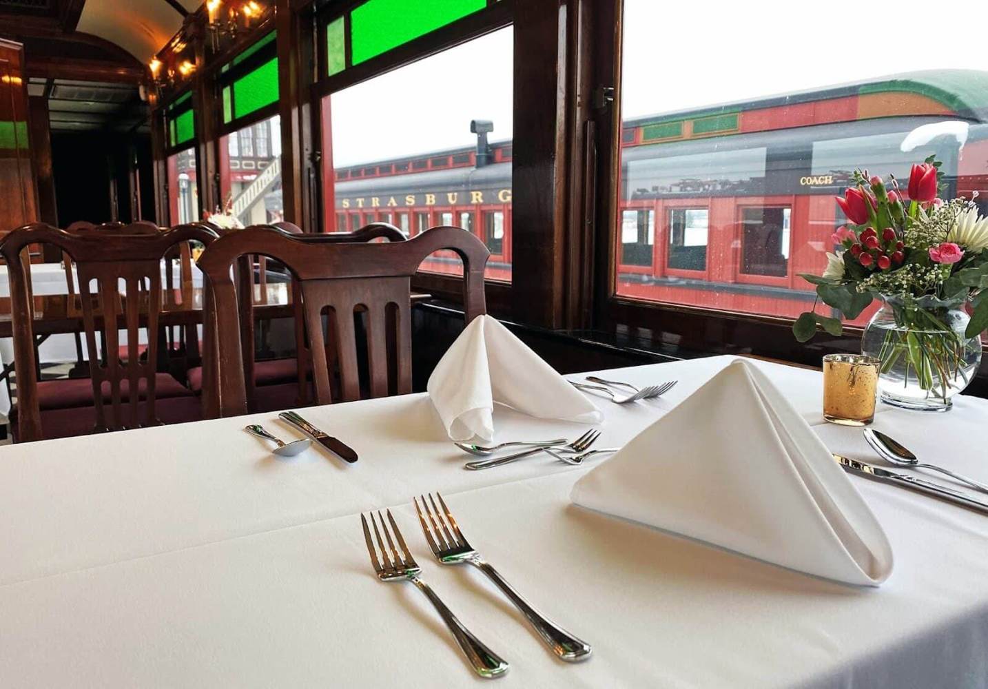 a dining room table set on the train